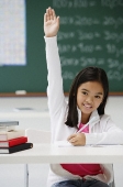 Girl raising hand in class - Asia Images Group