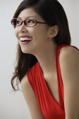 Young woman with spec laughing - Asia Images Group