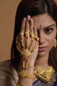 Indian woman wearing traditional wedding jewelry - Asia Images Group