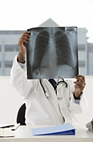 doctor viewing x-ray - Asia Images Group