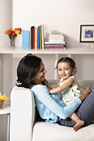 woman sitting with baby - Asia Images Group