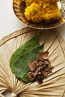 betel nut and leaves with chrysanthemums top view - Asia Images Group