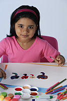 Little girl painting - Asia Images Group