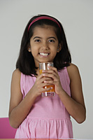 Girl with glass of juice - Asia Images Group