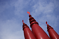 Red spires from Hindu Temple. - Asia Images Group