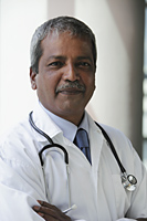 Head shot of Indian doctor - Asia Images Group