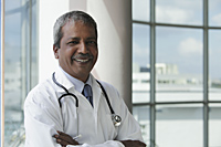 Head shot of Indian doctor smiling - Asia Images Group