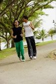 Young men jogging in park - Asia Images Group