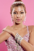 Young woman in Indian costume, looking at camera, hand on shoulder - Asia Images Group