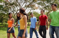 Group of young adults walking in park - Asia Images Group
