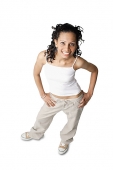 Woman smiling at camera, hands on hip - Asia Images Group