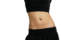 Woman with belly ring - Asia Images Group