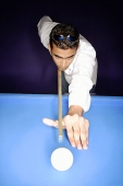 Man playing pool - Asia Images Group
