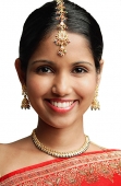 Woman in traditional Indian attire smiling at camera - Asia Images Group