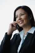 Businesswoman using mobile phone - Asia Images Group