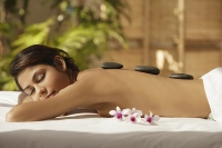 A woman relaxes at a spa - Asia Images Group