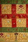 An embroidered quilt - Asia Images Group