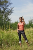 Young woman hiking in the wilderness - Asia Images Group