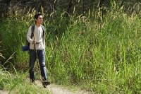 Young man hiking in the wilderness - Asia Images Group
