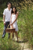 Young couple going for a picnic - Asia Images Group