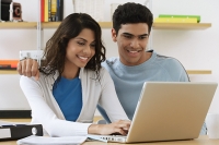 Young couple using laptop - Asia Images Group