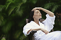 woman in white robe, sitting outside - Alex Mares-Manton