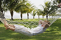 boy resting in a hammock - Alex Mares-Manton
