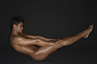 muscular man in yoga pose - Alex Mares-Manton