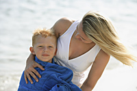 mother and son at beach - Alex Mares-Manton