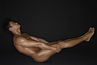 muscular man in yoga pose - Alex Mares-Manton