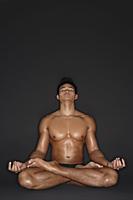 muscular man in full lotus position - Alex Mares-Manton