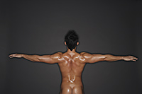 backside of muscular man - Alex Mares-Manton