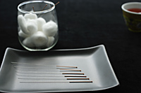 acupuncture needles, cotton balls, tea - Ellery Chua
