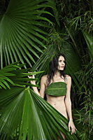 naked woman behind big tropical leaves - Alex Mares-Manton