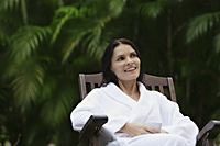 woman in white robe, sitting outside - Alex Mares-Manton