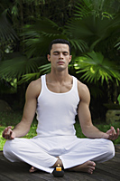 man practicing yoga - Alex Mares-Manton