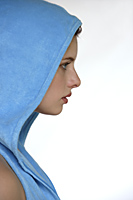 Profile of woman in blue hooded vest - Alex Mares-Manton