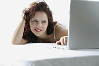 Woman working on laptop - Alex Mares-Manton