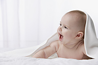 Profile of baby smiling - Alex Mares-Manton