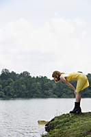 Girl looking into lake - Nugene Chiang