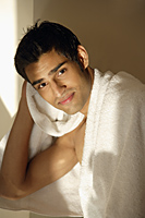 Man drying hair with towel - Alex Mares-Manton