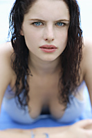 Portrait of woman in blue bathing suit - Alex Mares-Manton