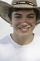 Teen boy in cowboy hat - Nugene Chiang