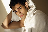 Man drying hair with towel - Alex Mares-Manton