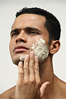 Man applying natural face scrub - Alex Mares-Manton