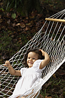 Girl swinging in hammock - Alex Mares-Manton