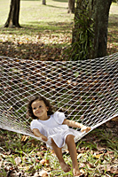 Girl sitting in hammock - Alex Mares-Manton
