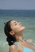 profile of young woman near ocean - Nugene Chiang