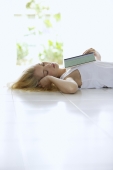 sleep young woman with book - Alex Mares-Manton