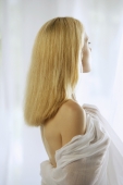 Profile of young woman with blond hair - Alex Mares-Manton